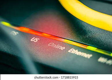 Broadband Wireless And Cable Modem And Router Indicating Connection Status Online By A Green LED Light