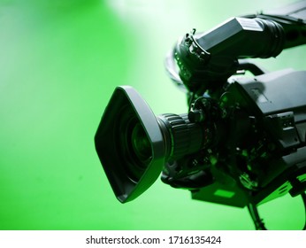 Broadcast Television Studio Camera With Greenscreen At TV Station.