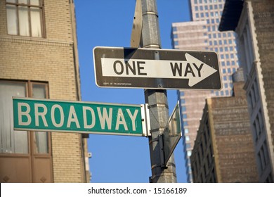 Broadway sign in New York city against urban background