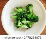 Broccoli in bowl high angle view