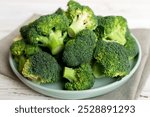 broccoli of fresh green broccoli in bowl over coloredbackground. , close up. Fresh vegetable.