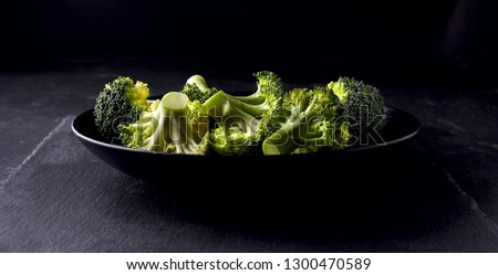 Similar – Small pieces of raw broccoli on white wood, Close up