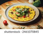 Broccoli Tomato Omelet Delight, A vibrant omelet featuring tender 