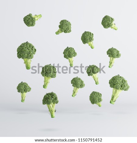 broccoli vegetable Floating on white background. minimal idea food concept.