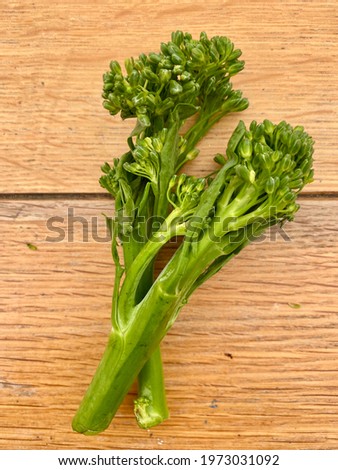 Broccoli vivid green close-up of healthy green food on a vintage rustic farmhouse table