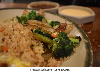 Brocolli And Fried Rice On A Plate