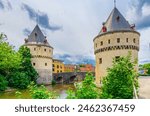 Broeltorens Broel Towers Gothic architecture style stone buildings, Broel Bridge across Lys river in Kortrijk city historical centre, Fortification towers, belgium landmark, Flemish Region, Belgium