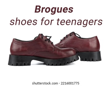 Brogue Shoes With Perforation On A White Background With The Inscription Footwear For Teenagers. Copy Space.