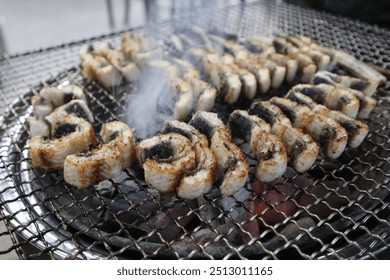 broiled eels,  Eel being grilled on fire, Grilled eel with salt, Grilled eel, Korean grilled eel, eels