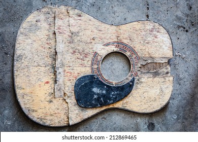 Broken Acoustic Guitar