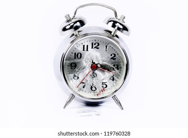 Broken Alarm Clock On White Background