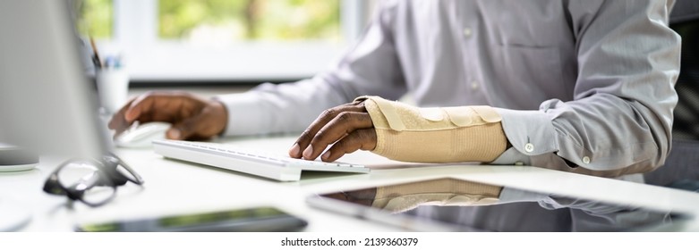 Broken Arm Office Accident. Worker Compensation And Social Coverage