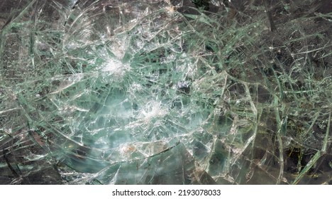 Broken Armored Glass. The Bullet Hit The Glass Of The Armored Car.