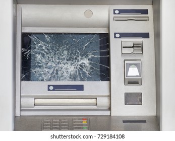 Broken ATM With Broken Glass. Act Of Vandalism And Hooliganism.