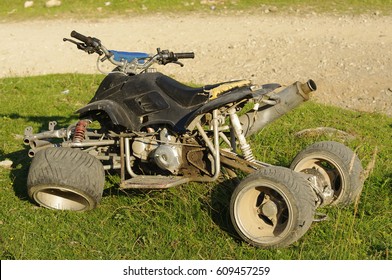 Broken Atv On The Field        