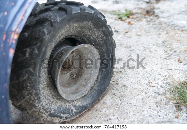 broken ATV\
wheel