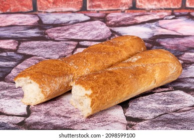 Broken Baguette On A Stone Table