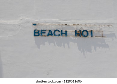 Broken Beach Hotel Sign.