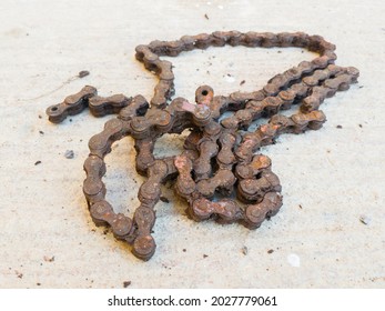 Broken Bicycle Chain Due To Rust And Old