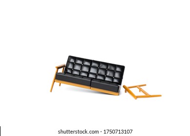 Broken Black Leather Sofa With Wood Leg On White Background, Broke And Fix Concept