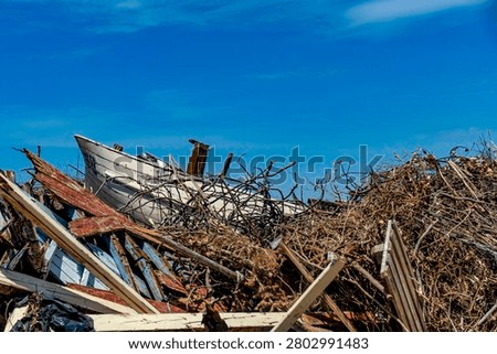 Broken boat in a scrapyard