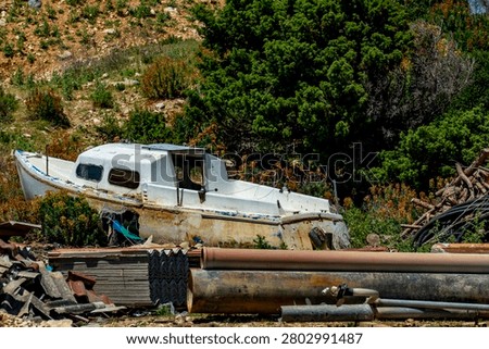 Broken boat in a scrapyard