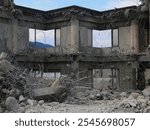 A broken building that is under ongoing demolition.
This image was taken from inside the building.
A scene from a redevelopment site in rural Japan.