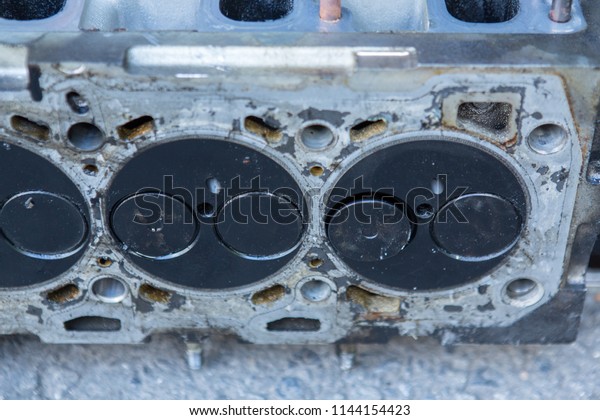 broken car engine valve close\
up
