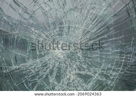 Broken car glass close-up as background