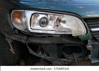 Broken Car Headlight, Blue Car, Destroyed Front Light On The Right Side