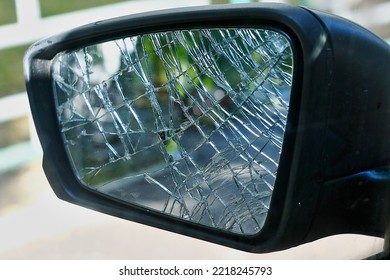 A Broken Car Mirror After An Accident