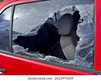 Broken car side window after theft
