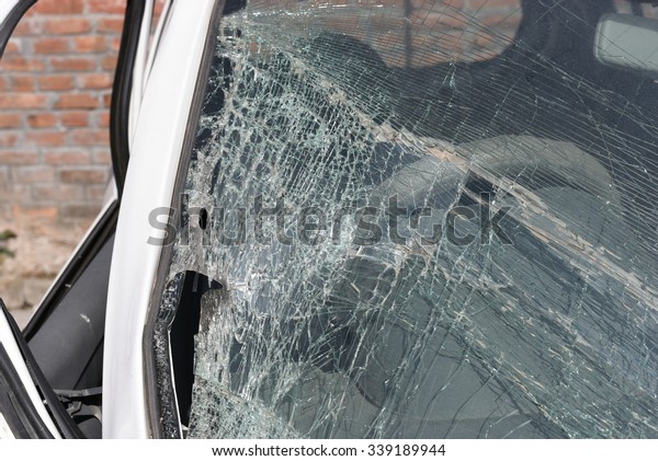 Broken car\
windshield. Car accident. Selective\
focus