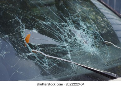 broken car windshield assault vandalism shard