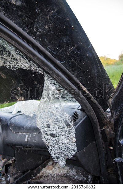 Broken car windshield close-up. Accident, downed\
crossings. Concept