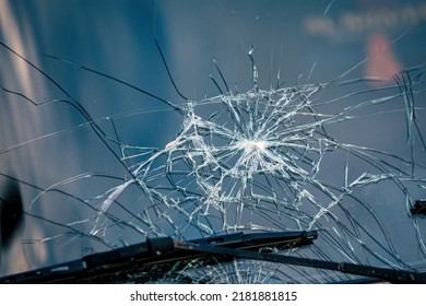 Broken car windshield. Cracked glass windshield of automobile. Accident of car. Selective focus - Shutterstock ID 2181881815
