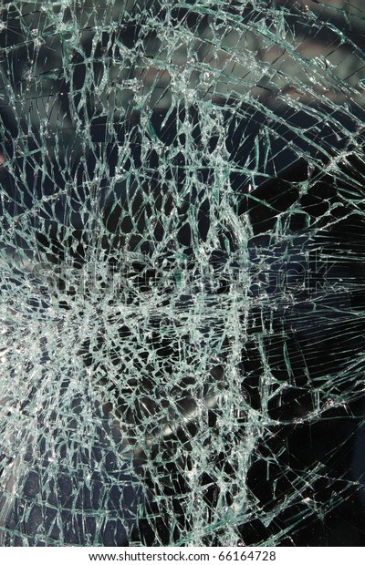 Broken car\
windshield made of laminated\
glass