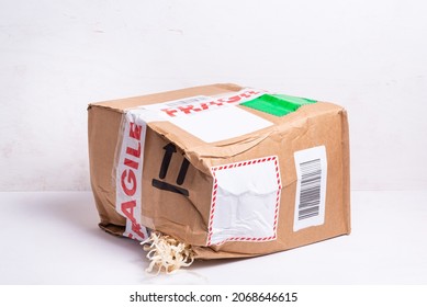 Broken Cardboard Box, Fragille Marked Parcel