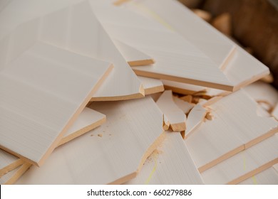 Broken Ceramic Tiles. Folded In An Iron Container. Marriage In Production. Selective Focus 