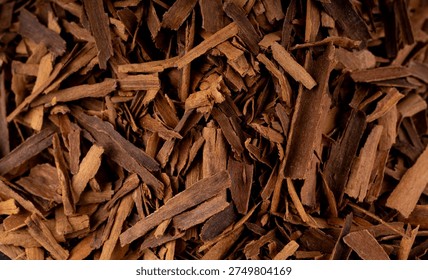 Broken ceylon cinnamon macro texture, cinnamomum verum bark pieces pattern, macro zeylanicum bg, real original cinnamon sticks wallpaper, dry crumbled brown bark background close up