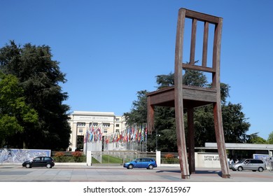 The Broken Chair by Daniel Berset, Memorial to the victims of landmines in front of the United Nations Building. Geneva. Switzerland.  05-25-2015