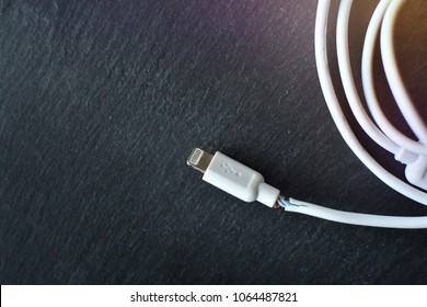 Broken Charging Cable Ob A Stone Table