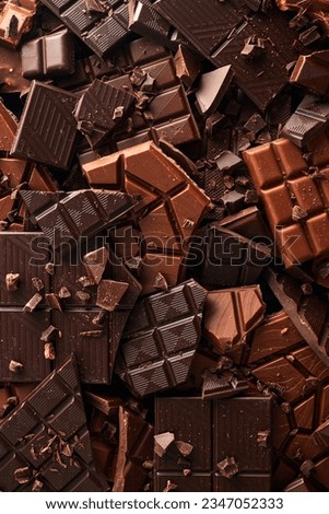 Broken chocolate bar texture background