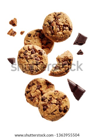 Broken chocolate chip cookies. Cookies broken in pieces with crumbs. 