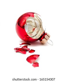 Broken Christmas ball isolated on white 