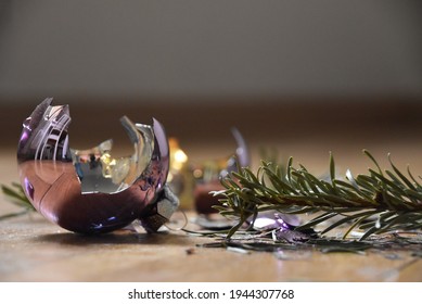 A Broken Christmas Tree Decoration, Quarrel, Fight, Argument, X -mas, Glass Bulb, Unhappy, Family Apart, Sadness, Pine, Floor, Damage, Friendship, Relationship, End,loss, Sadness, Loneliness,solitude 