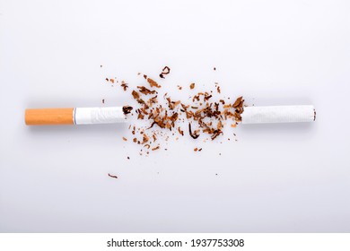 Broken cigarette on white background , World No Tobacco Day Tobacco and lung health concept . - Shutterstock ID 1937753308