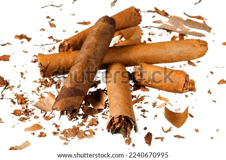 Broken cigars isolated on white background