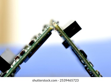 broken circuit board with electronic components close up image , technology concept.