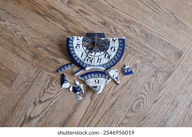 Broken Clock. Lost Time. Missed opportunities. Collected fragments of broken wall clock. The concept of lost time. The concept of lost time and missed opportunities